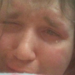 Chris crying over Quinn.jpg