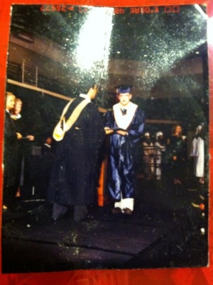 Chris accepting diploma at MHS graduation.jpg